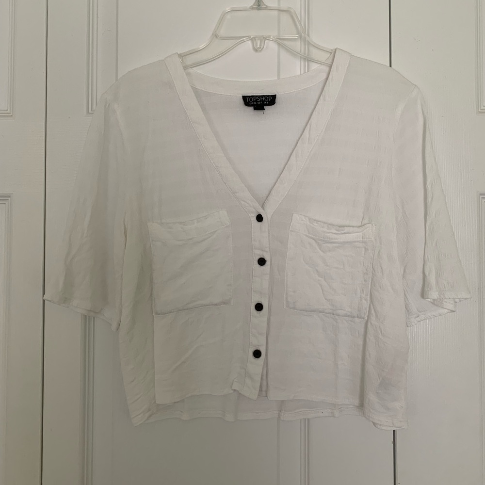 Topshop cropped house. White with a light stripe pattern (not really noticeable)